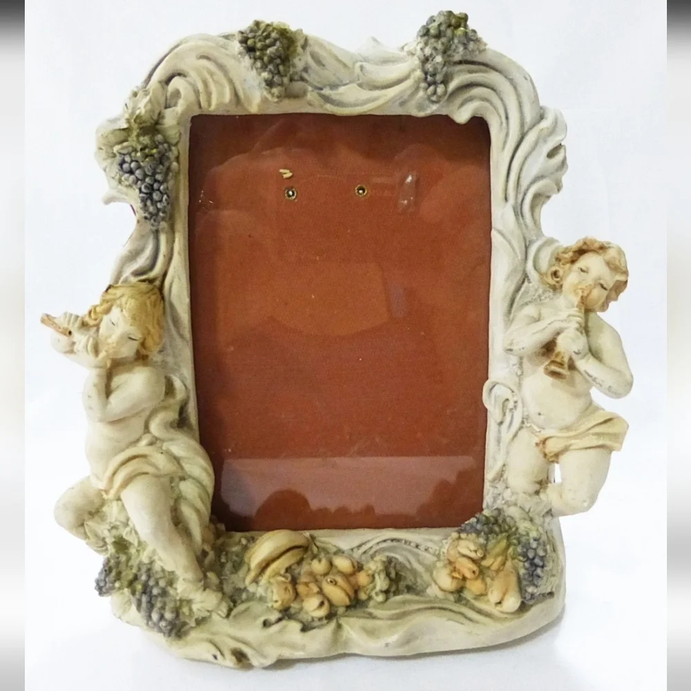 vintage angels photo frame made out of resin.